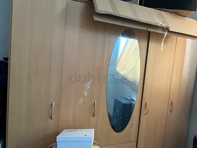 Light wood wardrobe with oval mirror - good used condition