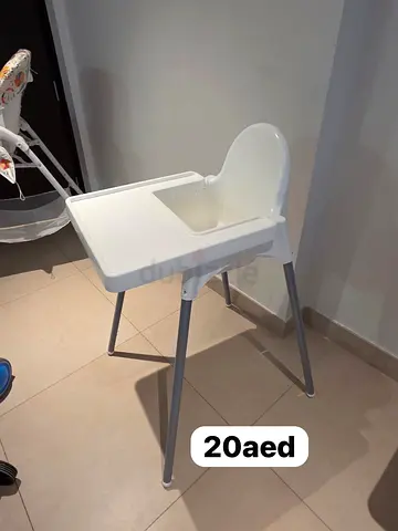 Simple white baby high chair - sturdy and easy to clean