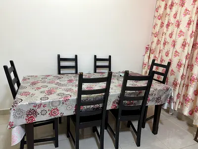 Dinning table with six chairs available