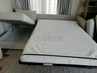 L-shaped sofa with pull-out bed - good condition