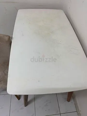 Take for free Used white rectangular dining table with wooden legs