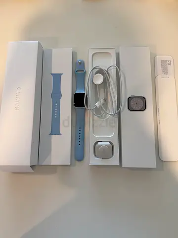 Apple Watch with original box, charger and extra blue sport band (new condition)