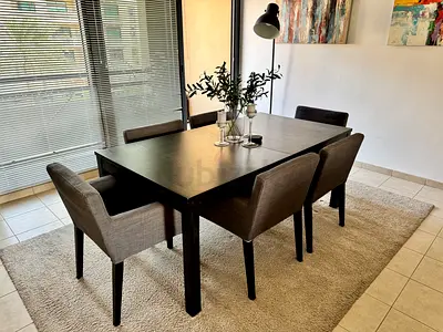 IKEA Solid Dark Wood Dining Table with 6 Upholstered Chairs - Good Condition