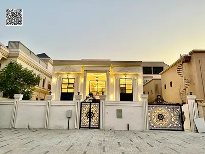 A luxurious classic villa at a special price, including air conditioning, elevator, swimming pool, and a strategic location close to Dubai and its ser