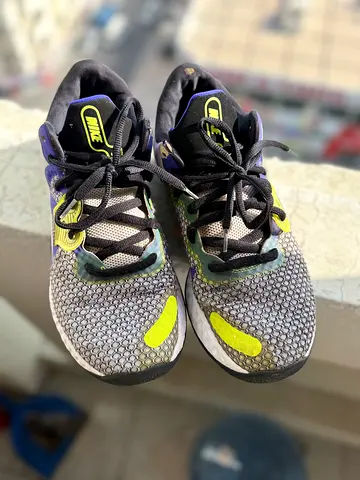 Used Nike Renew Arena running shoes - size 11, good condition