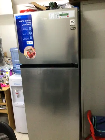 Silver double-door refrigerator, good working condition