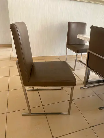 Italian modern grey/ brown leather dining chairs with stainless steel frames (set of 8). Brand: Mood