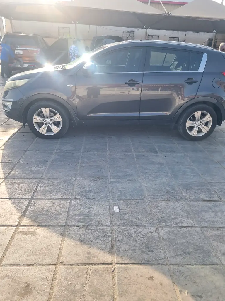 Kia Sportage 2014 — photo 1 of 4