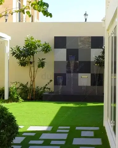 Garden Artificial Grass with Water Feature - Well Maintained