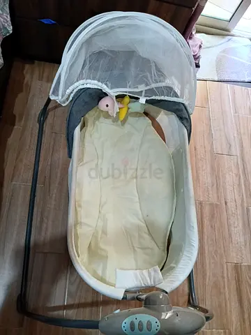 Baby rocker bassinet with canopy and mobile - preowned