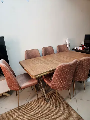 Solid wood dining table with 6 velvet chairs - Excellent condition