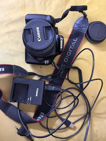 Canon EOS 1100D DSLR with Strap and Charger - Used + godox mini flash