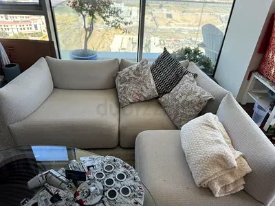 Light beige 3-seater modular sofa with ottoman - good condition