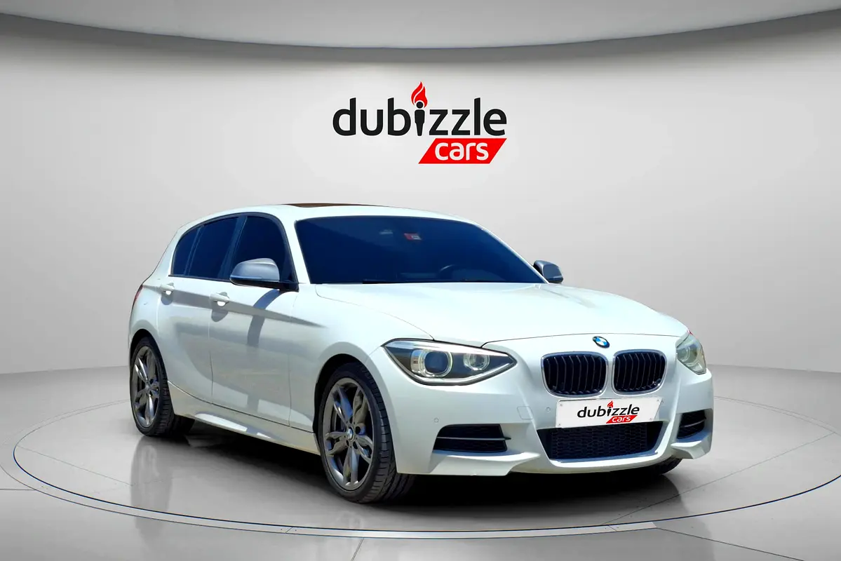 BMW 1-Series 2014 — photo 1 of 14