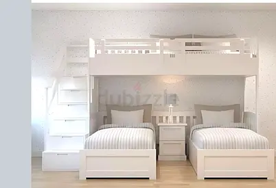 White wooden bunk bed with twin beds and storage stairs