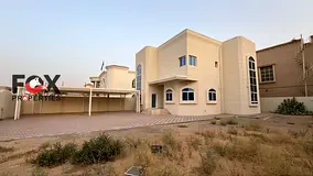 Luxury villa for annual rent in Al Raqaib, Ajman, with premium finishing, very spacious majlis &amp;