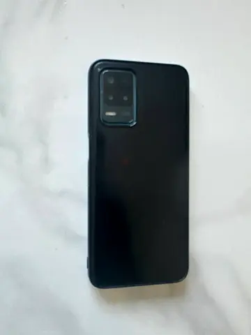 New one on Amazon is 1725 dirhams. Used blue color Realme 5g 128 gb 6gb RAM smartphone with case