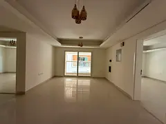 Three-bedroom apartment with a living room for annual rent in Ajman, Al Muwaihat 3, next to Al Shuwa