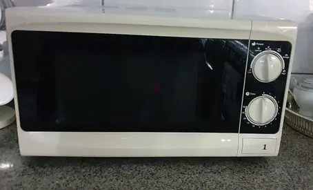 Used compact microwave oven, perfect condition