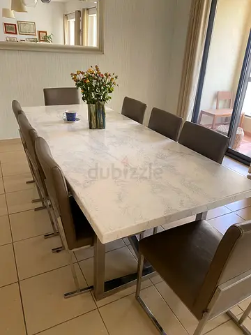 8 Italian modern brown leather dining chairs with stainless steel frames (set of 8). Brand: Mood