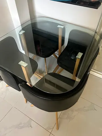Compact Glass Dining Set with Four Chairs