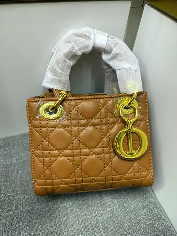 Dior brown quilted leather handheld bag with gold hardware