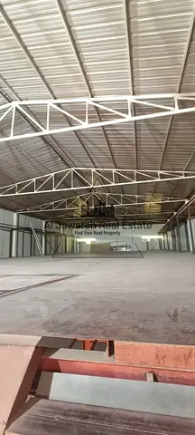 Mezzanine warehouse for annual rent in Umm Al Quwain, located in a practical industrial area with easy access to main roads. It is an excellent