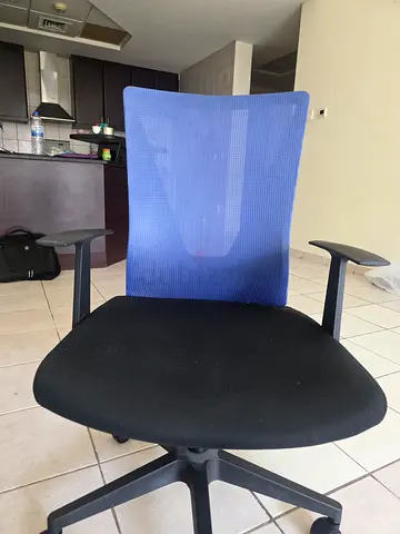 Blue mesh office chair with armrests - good used condition