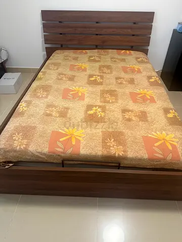 Queen size hydraulic bed from homecenter with mattress available for sale hardly used one year old