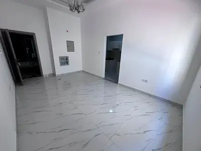 Spacious brand-new studio apartment available for annual rent in Al Jurf 2, Ajman, near Delta Center. Modern layout with separate kitchen and excellen