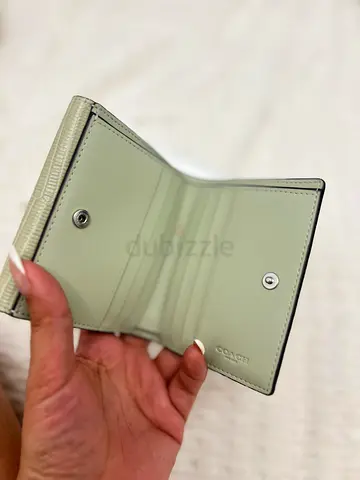 Unused Coach small trifold leather wallet - light green