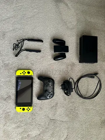 Nintendo Switch console with dock, Pro controller, Joy-Con neon yellow + accessories