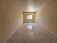 Studio apartment next to Al Safir Mall, built-in wardrobes, semi-separate kitchen, large area and ex