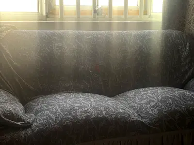 Two-seater fabric sofa in grey paisley pattern - good condition