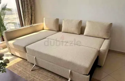 Ikea Beige L-shaped Sofa Bed with Pull-out Bed - Good Condition