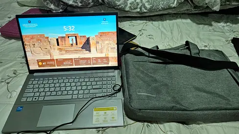 ASUS VIVOBBOK Lightweight 14-inch Silver Laptop with Charger and Carry Case - Good Condition