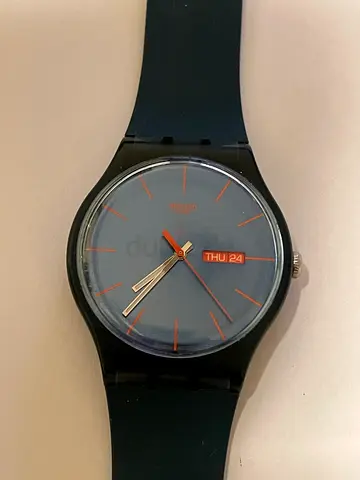 Swatch mens analog watch with day/date - navy strap