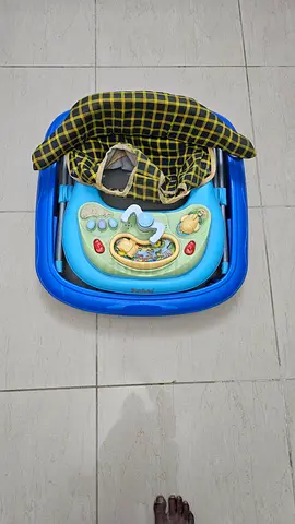 Used baby walker with activity tray  n music- good condition