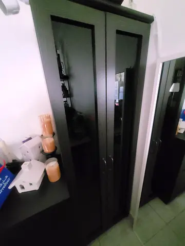 Dark wood 2-door wardrobe with black glass panels