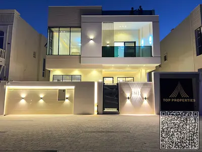 For sale: A luxurious villa with a modern design and spacious layout in Al Zahia area, Ajman. The villa boasts a built-up area of ​​3500 sq ft, 5 mast