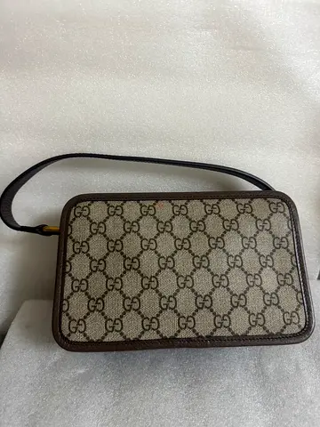 Pre-owned Gucci Ophidia Camera Bag styled in the classic GG Supreme canvas motif.