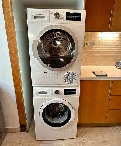 Bosch Series 6 laundry pair consisting of a 9kg washer and a 9kg dryer stacked together.