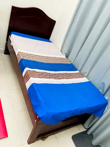 Single wooden bed frame with headboard - good condition