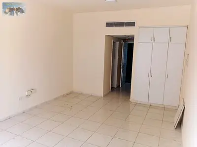 Studio apartment for annual rent in Ajman Al Nuaimiya area Spacious with a separate kitchen and builtin wardrobes Unbeatable price