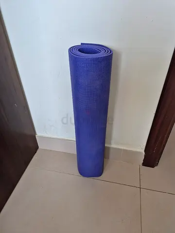 Used blue yoga mat - good condition