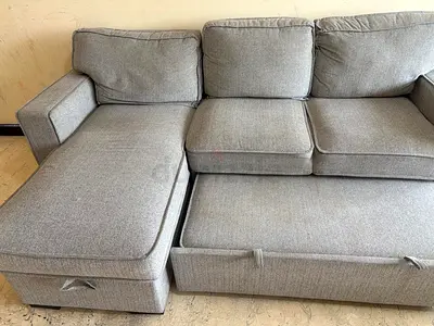 Light grey L-shaped sofa with storage (3-seater chaise)