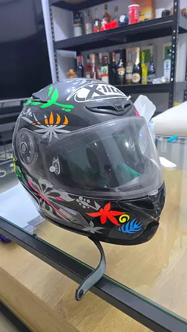 X-lite full face motorcycle helmet with floral graphics