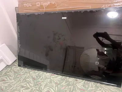 TCL 55 inch Smart TV (Google TV) display in damage condition