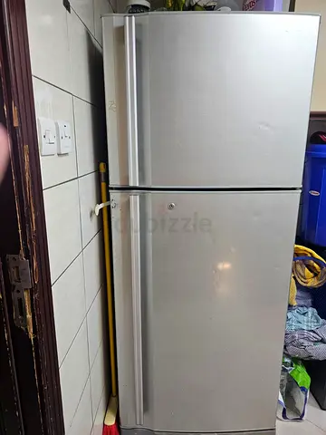 Silver Top-Freezer Refrigerator - Good Working Condition