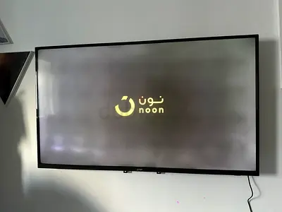 55 Inch Flat Panel TV (wall-mounted) - Noon Brand